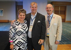 Chris Plonsky (Texas), outgoing president Andy Seeley (UCF) and CoSIDA Executive Director Doug Vance.
